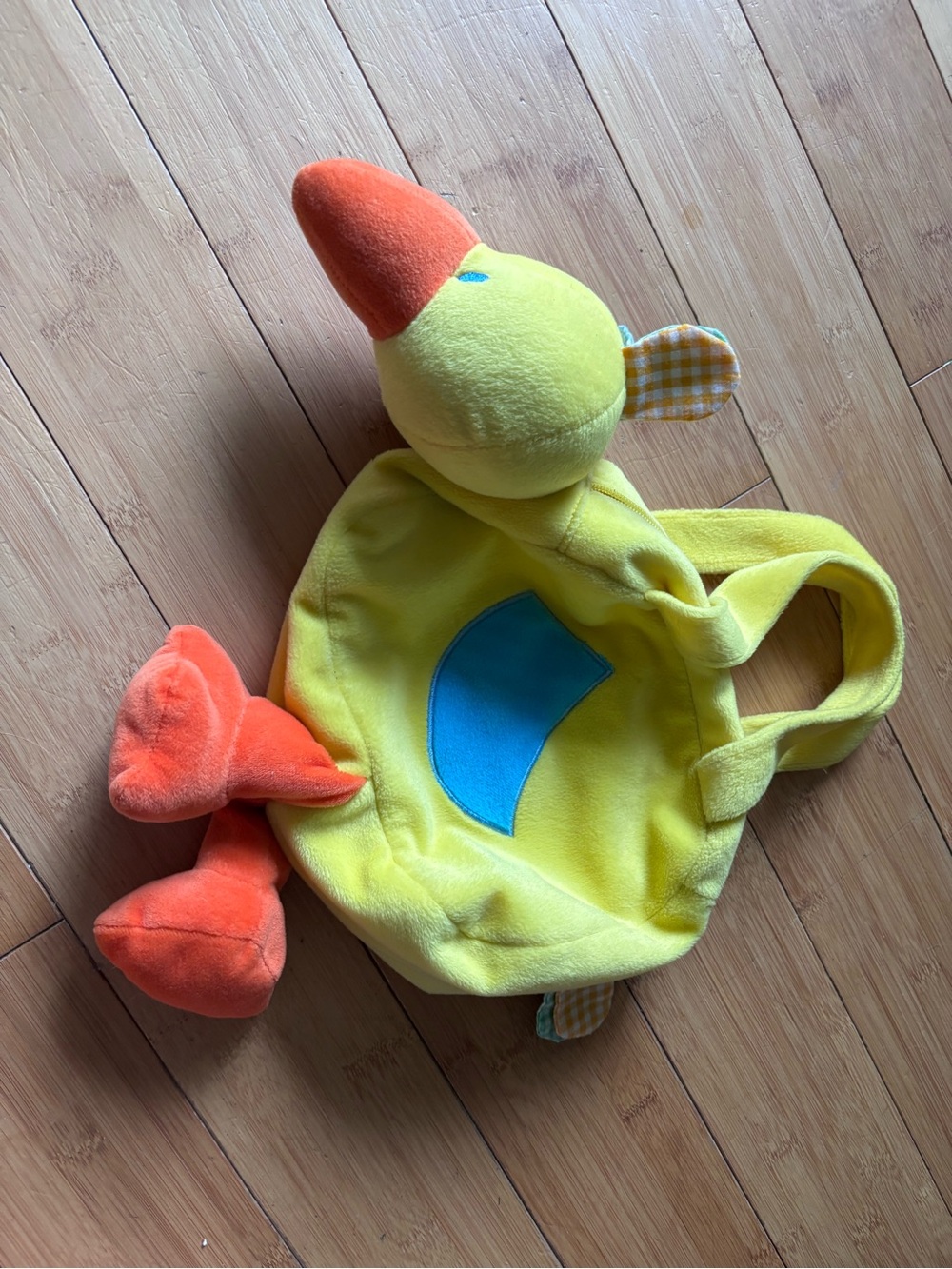 Yellow Plush Duck Bag with Orange Beak, Feet, and handles.